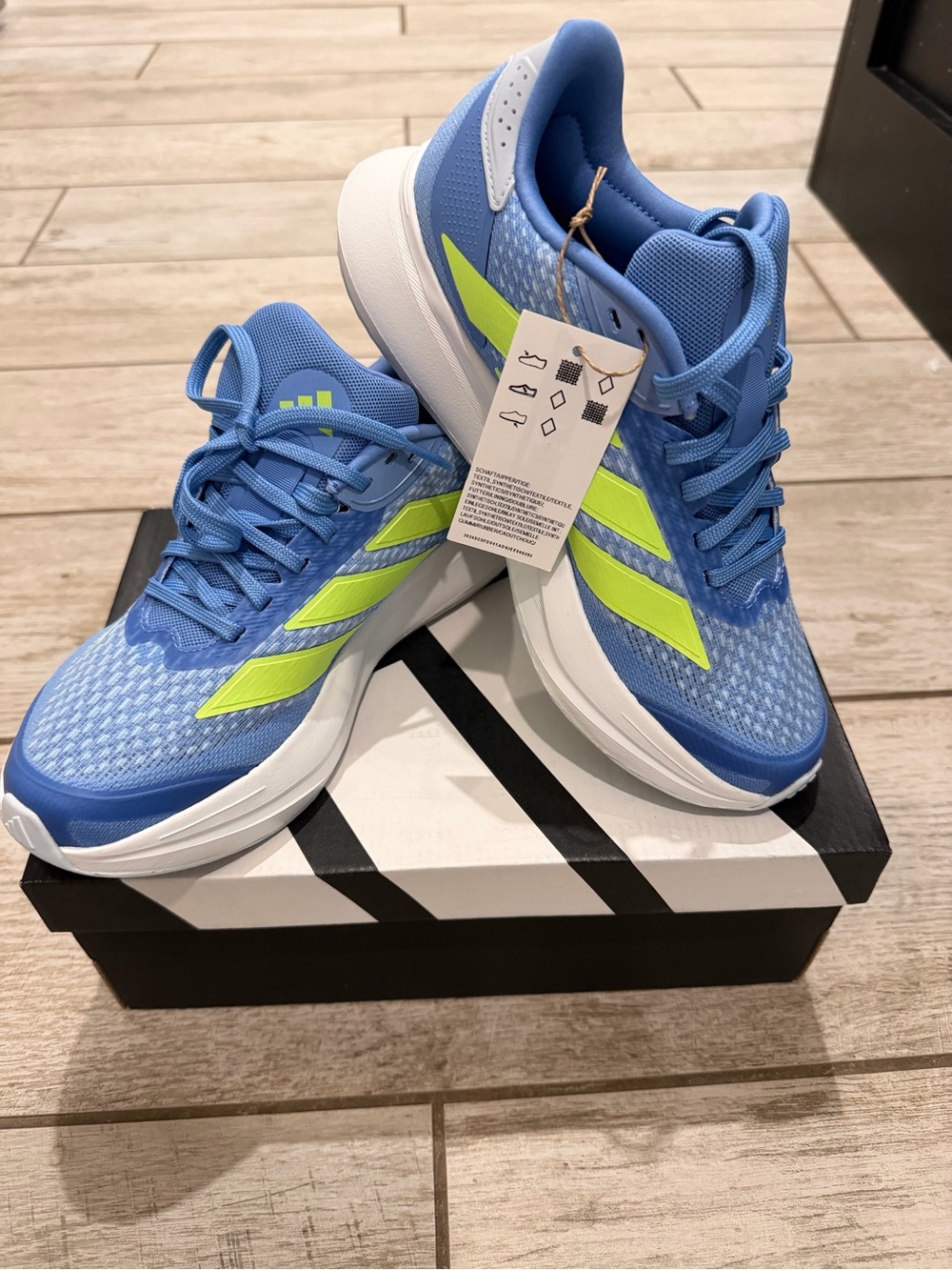 adidas women’s Blue Sneakers with Neon Yellow Stripes size 8